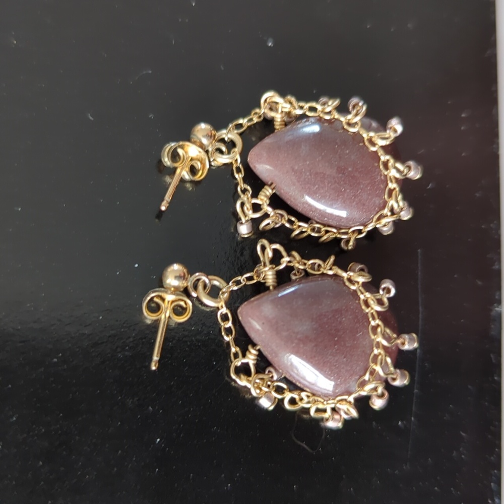 Brown gemstone drop earrings with gold accents
